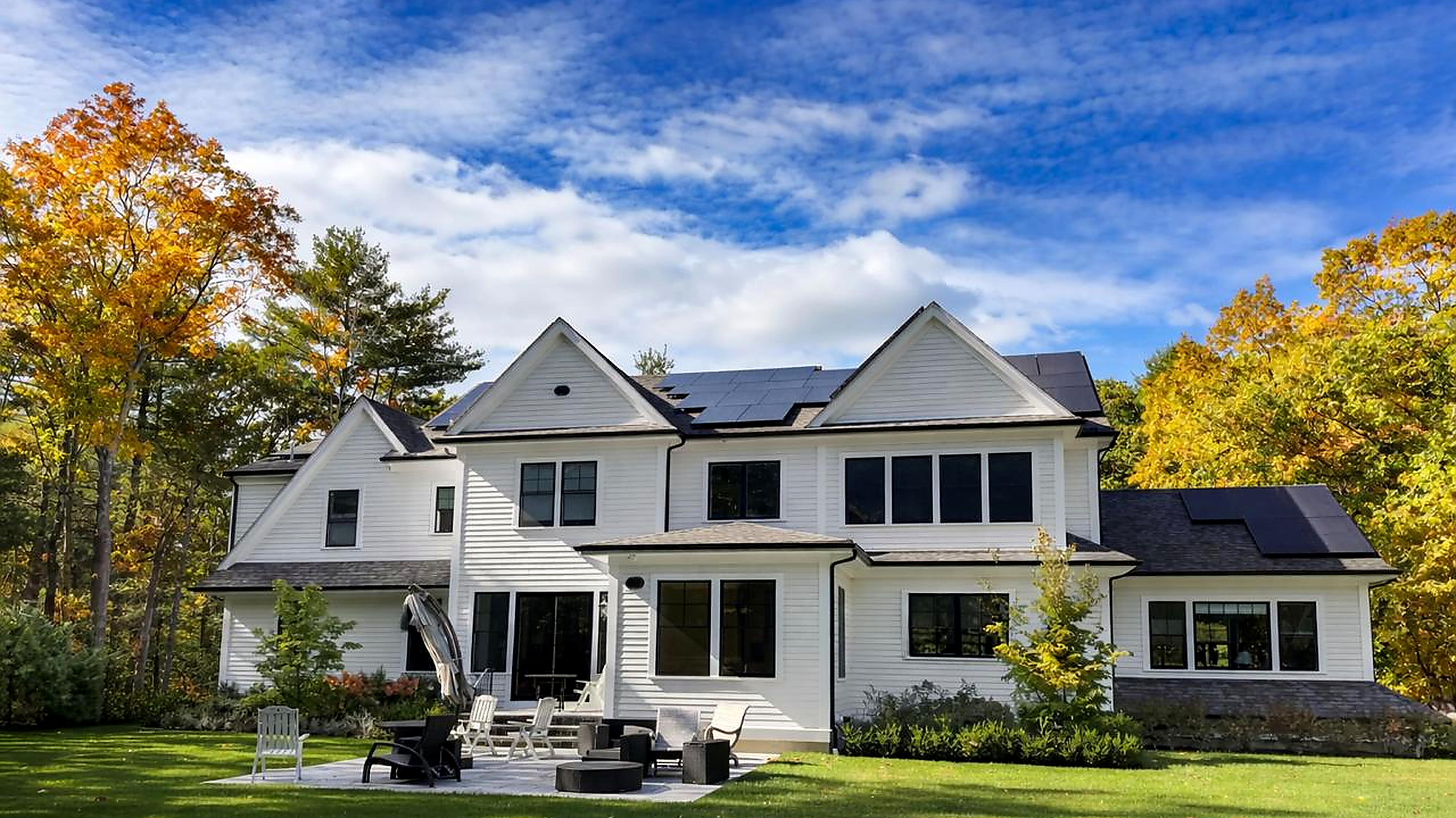 Professional house painter working on a residential project