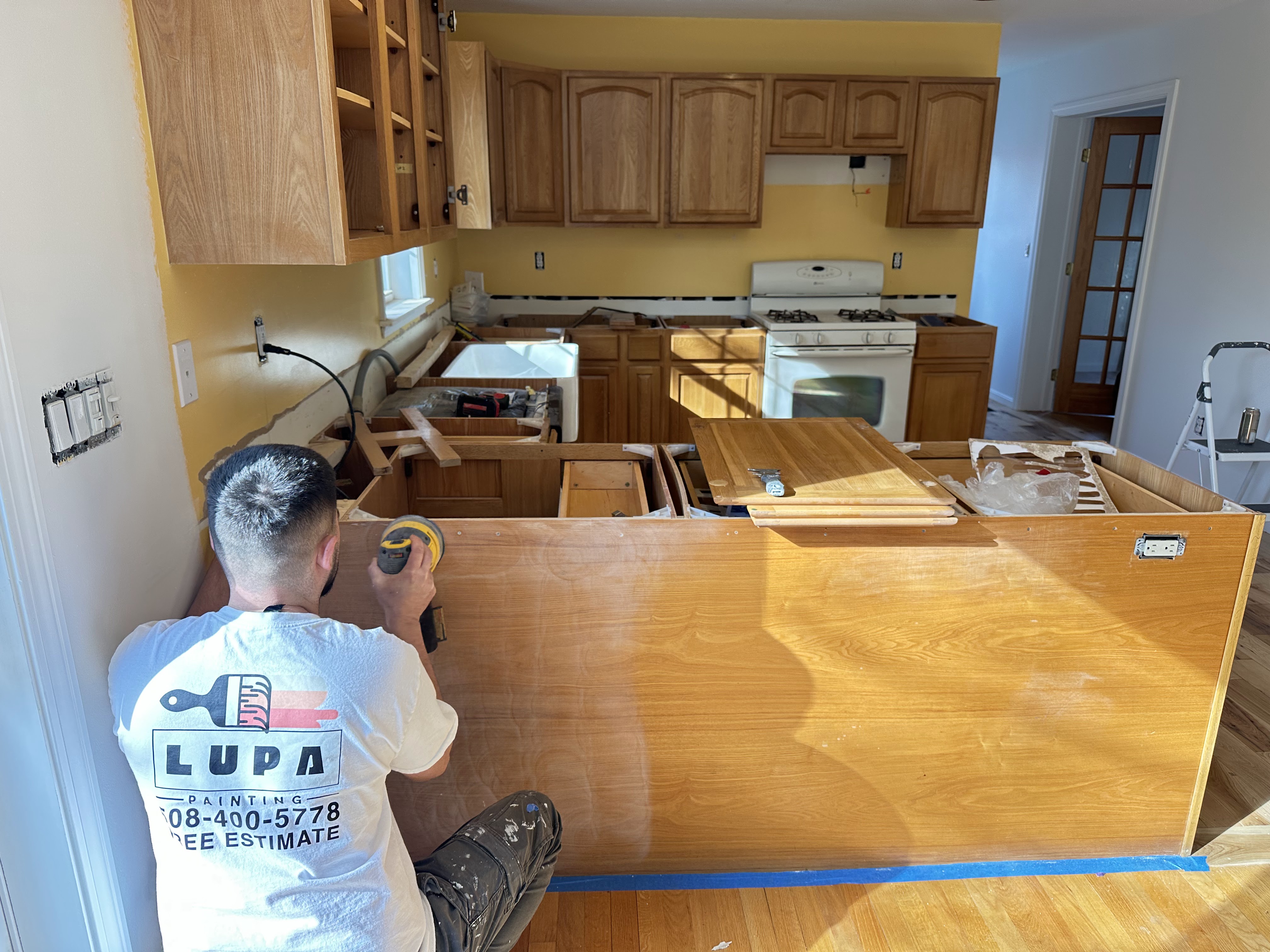 Kitchen cabinet painting with smooth satin enamel finish