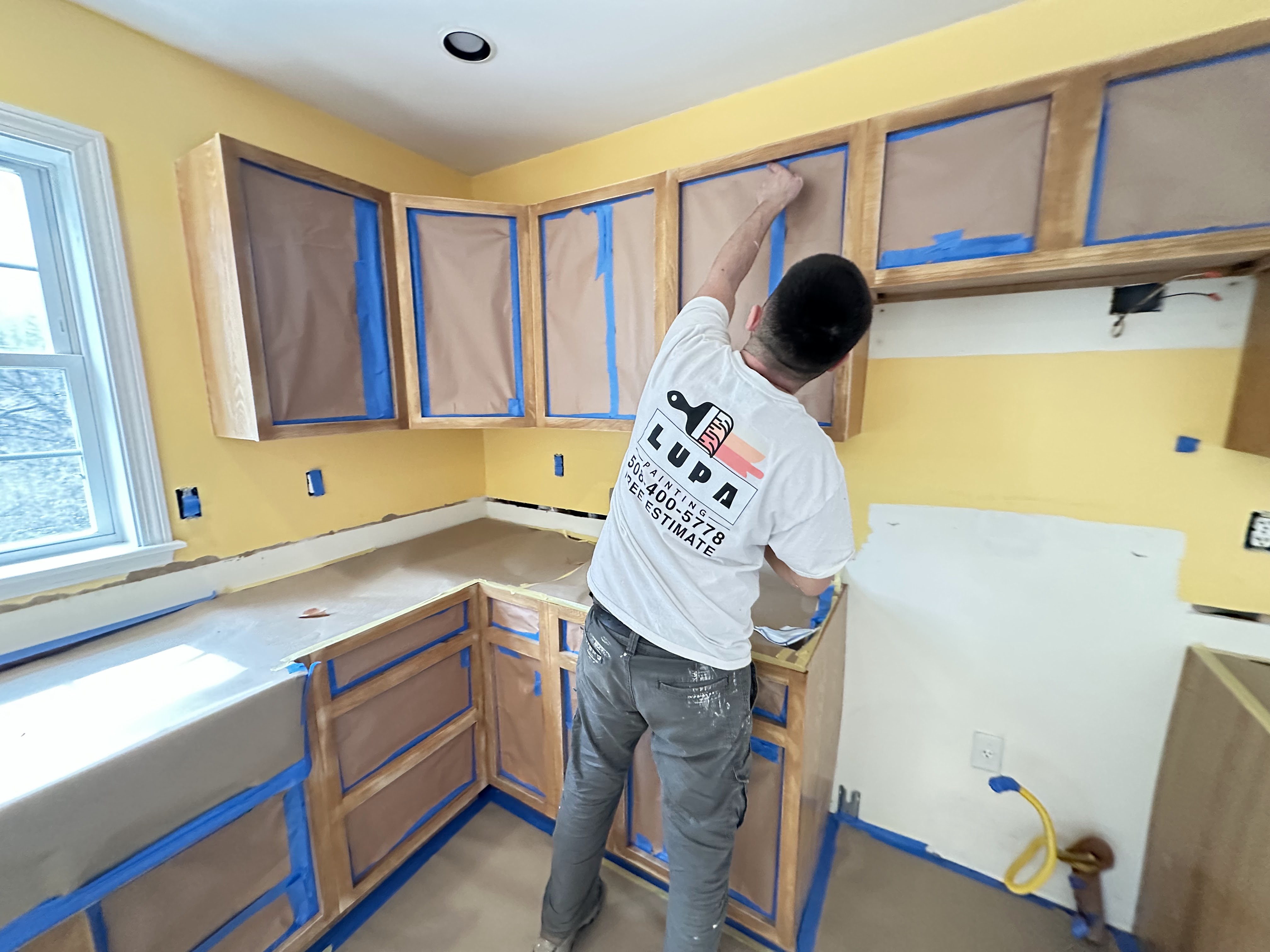 Cabinet painting finish detail with clean edges and smooth leveling