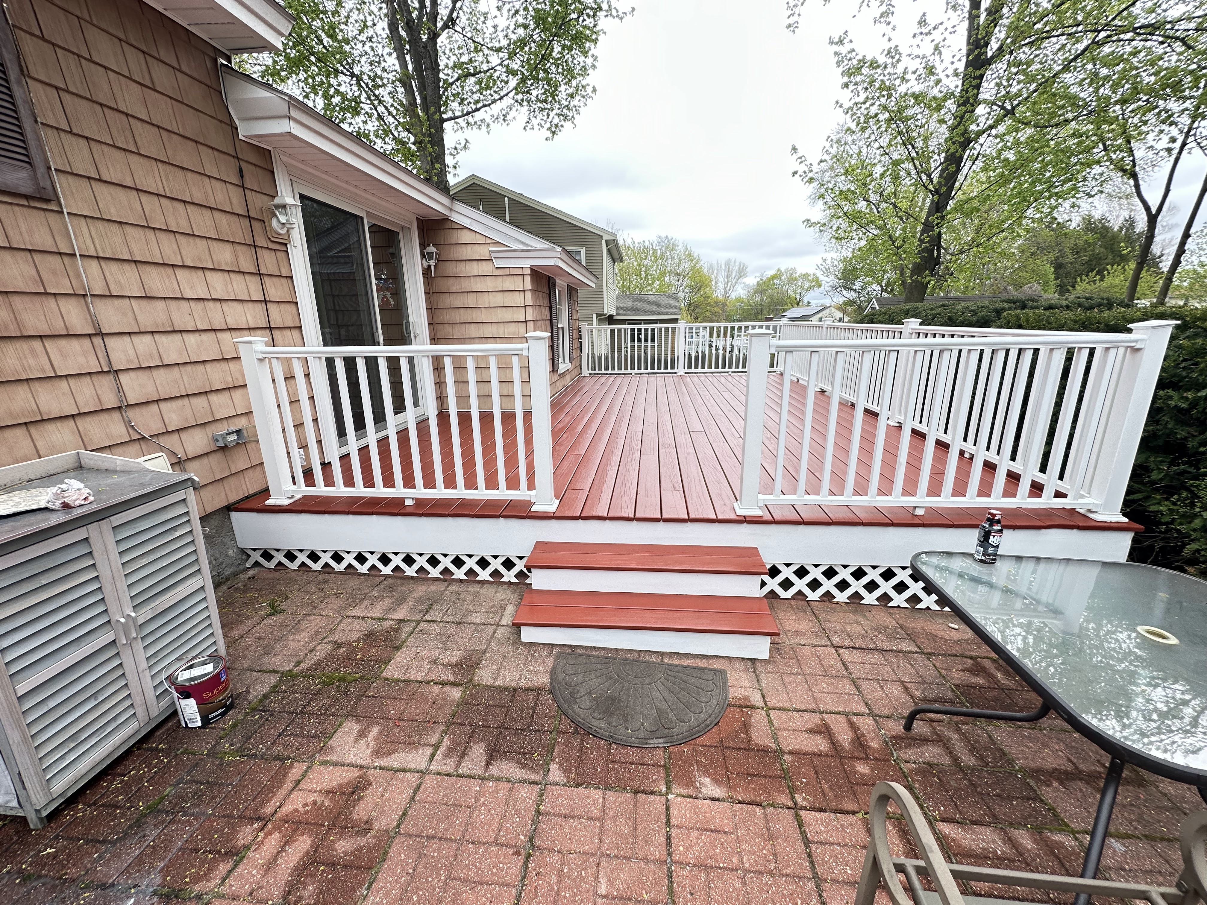 Masking and site control during a deck and fence painting project