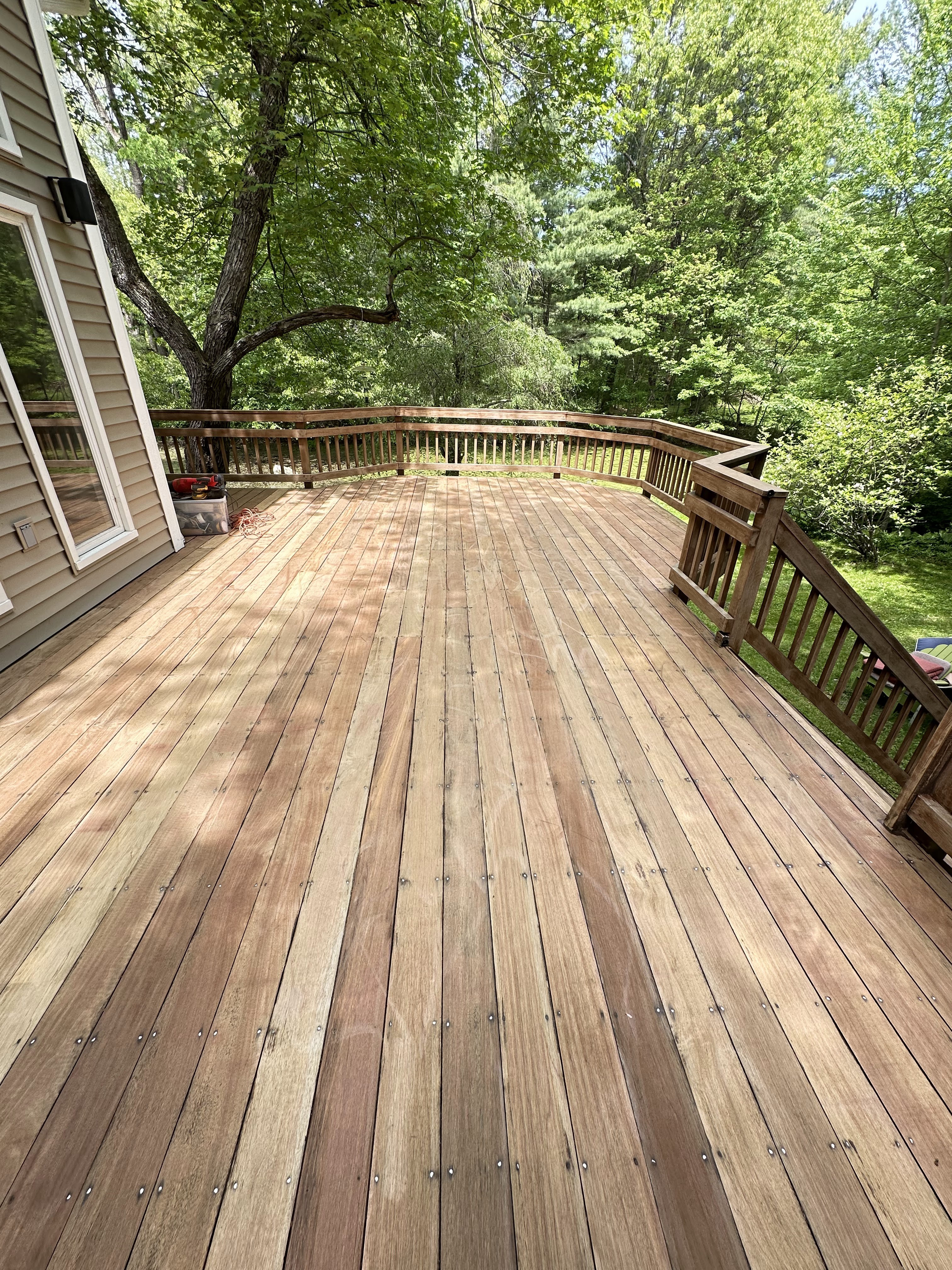 Deck painting with consistent color and durable exterior finish