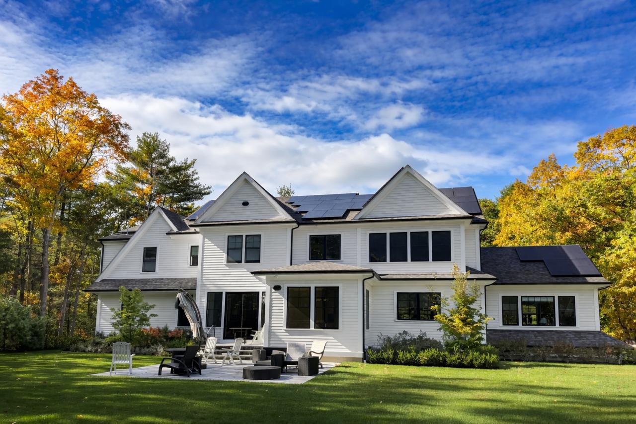 Close-up of exterior trim painting with sharp cut lines and smooth finish