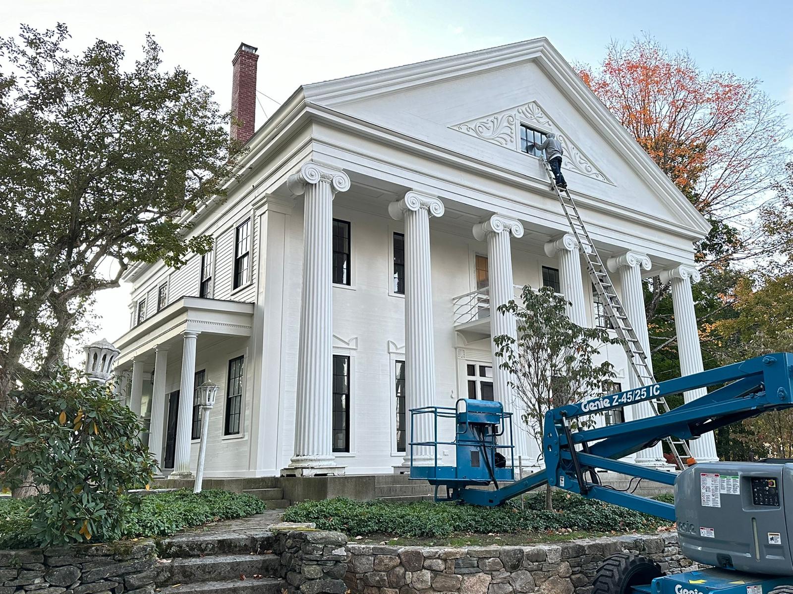 Fence staining project with uniform natural wood tone