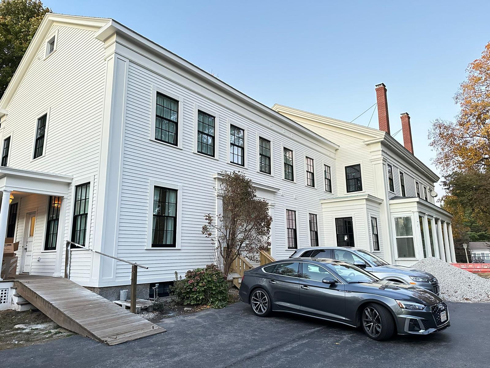 Fence staining project with uniform natural wood tone