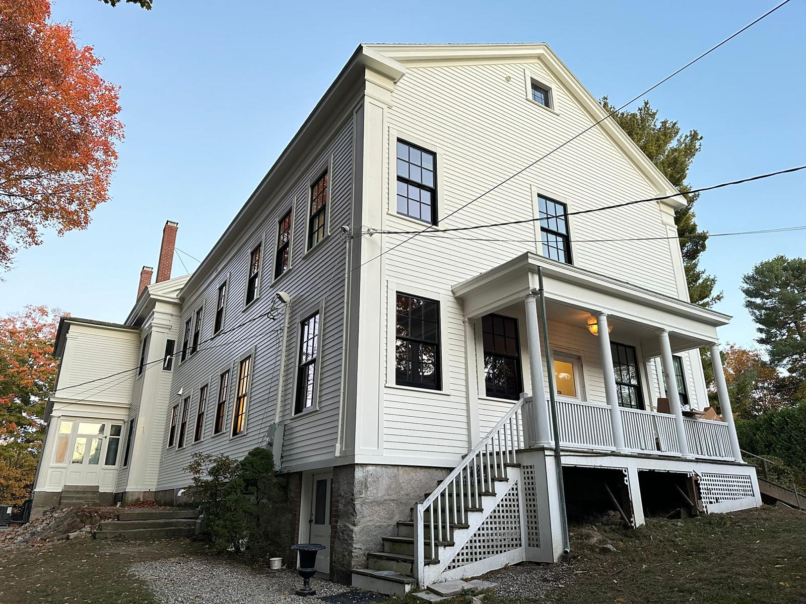 Fence staining project with uniform natural wood tone