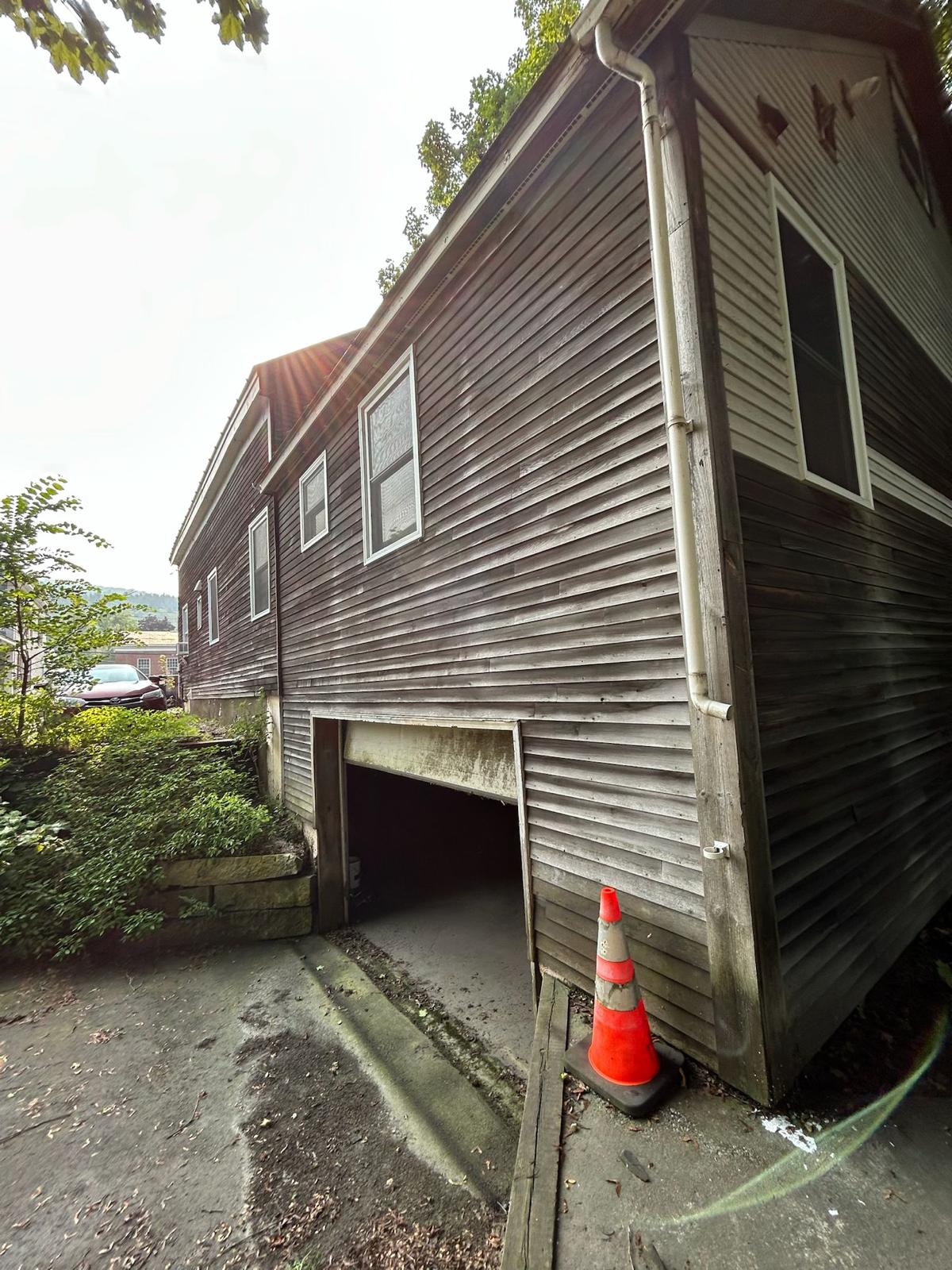 Fence staining project with uniform natural wood tone
