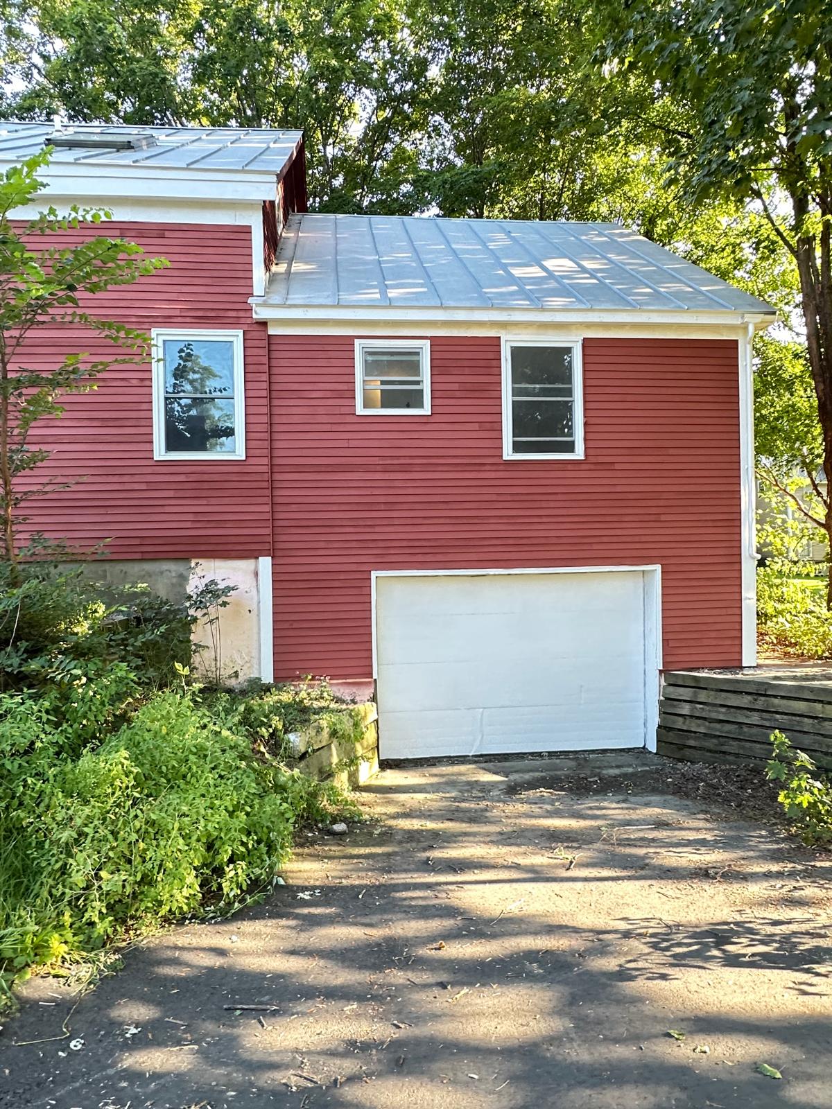 Fence staining project with uniform natural wood tone