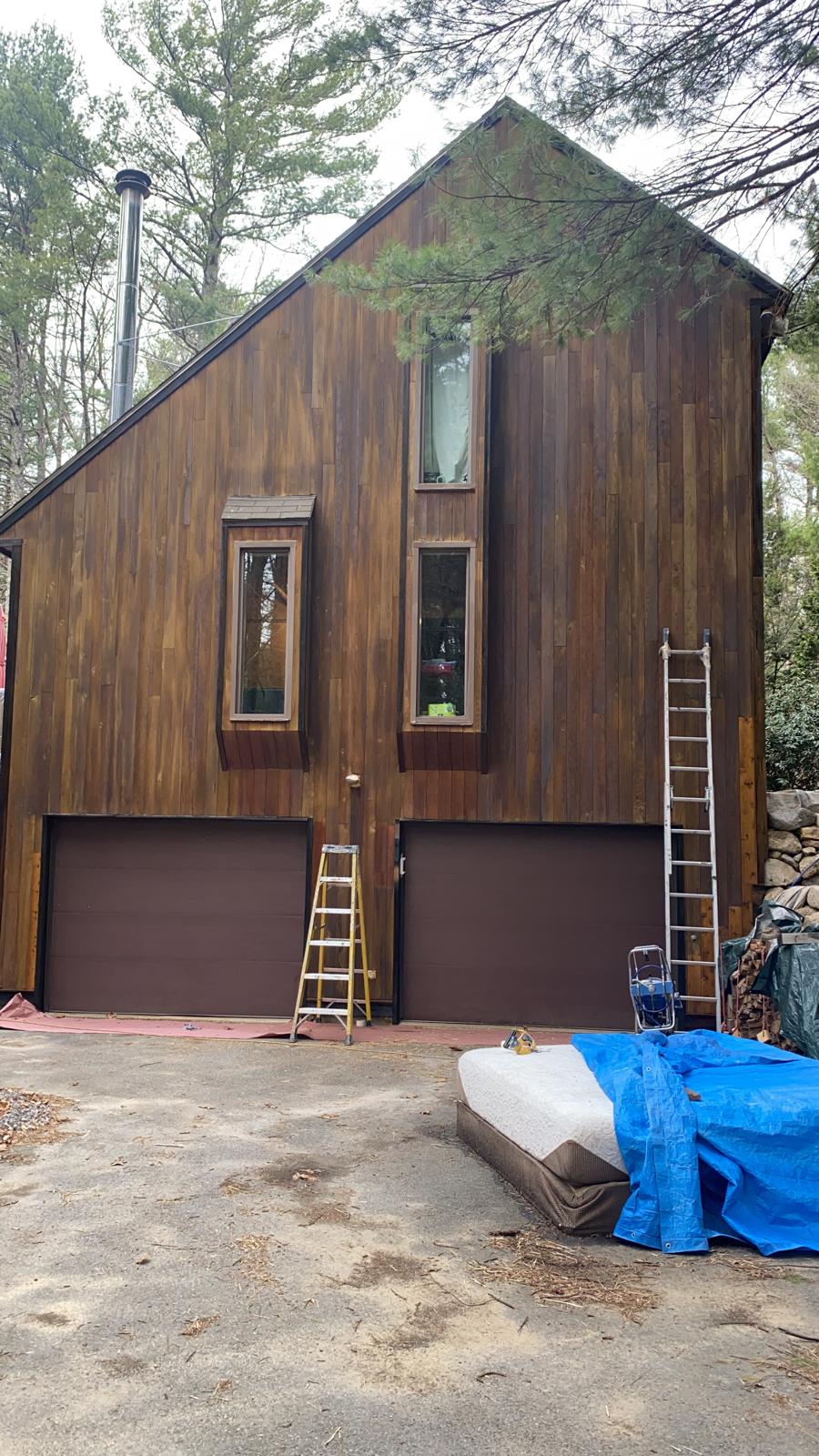 Deck refinishing with protective stain and sealed wood