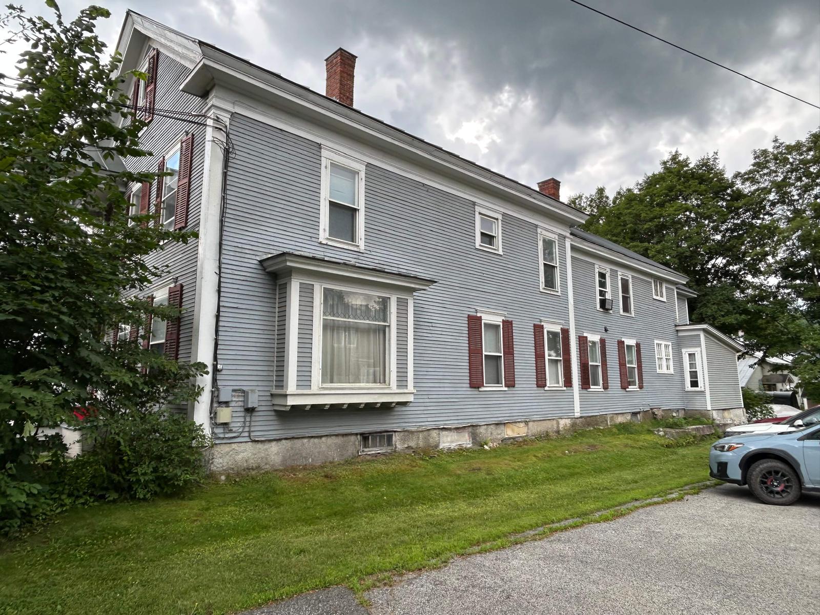 Fence staining project with uniform natural wood tone