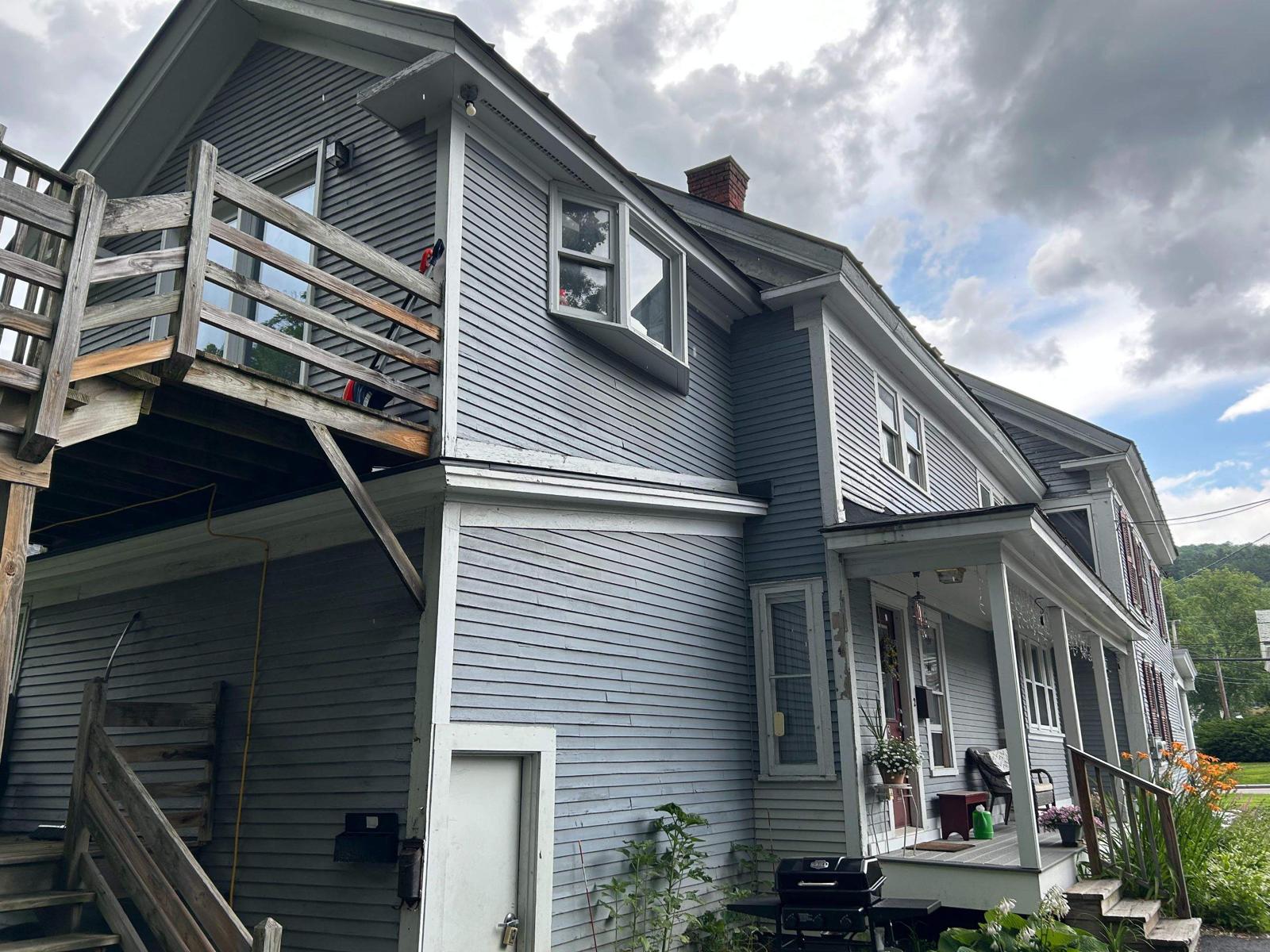 Fence staining project with uniform natural wood tone