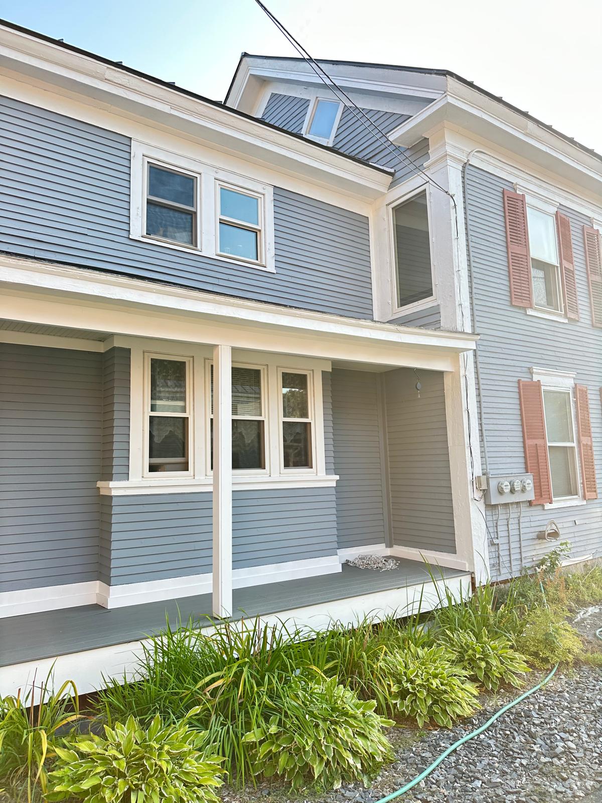 Fence staining project with uniform natural wood tone