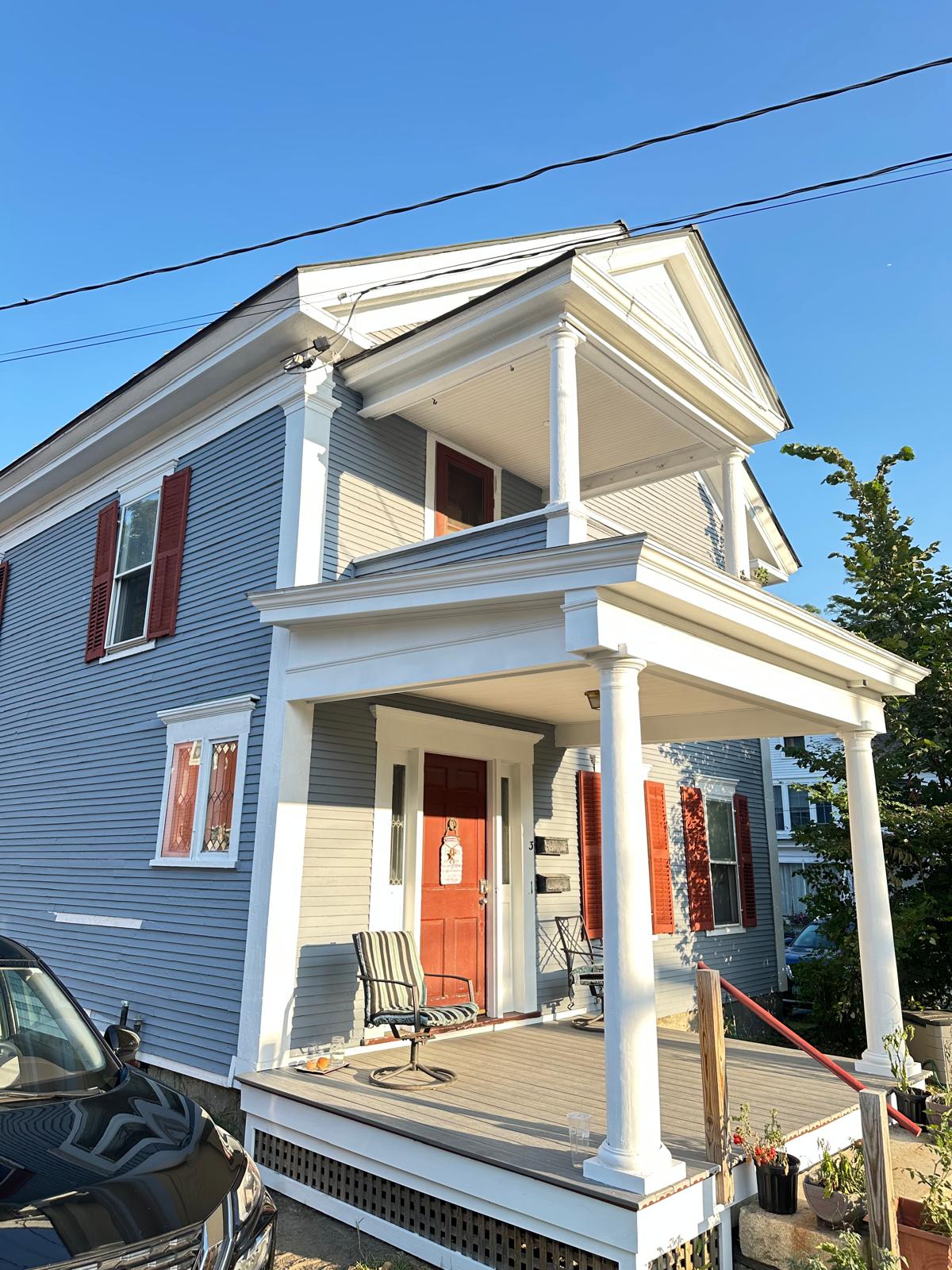 Fence staining project with uniform natural wood tone