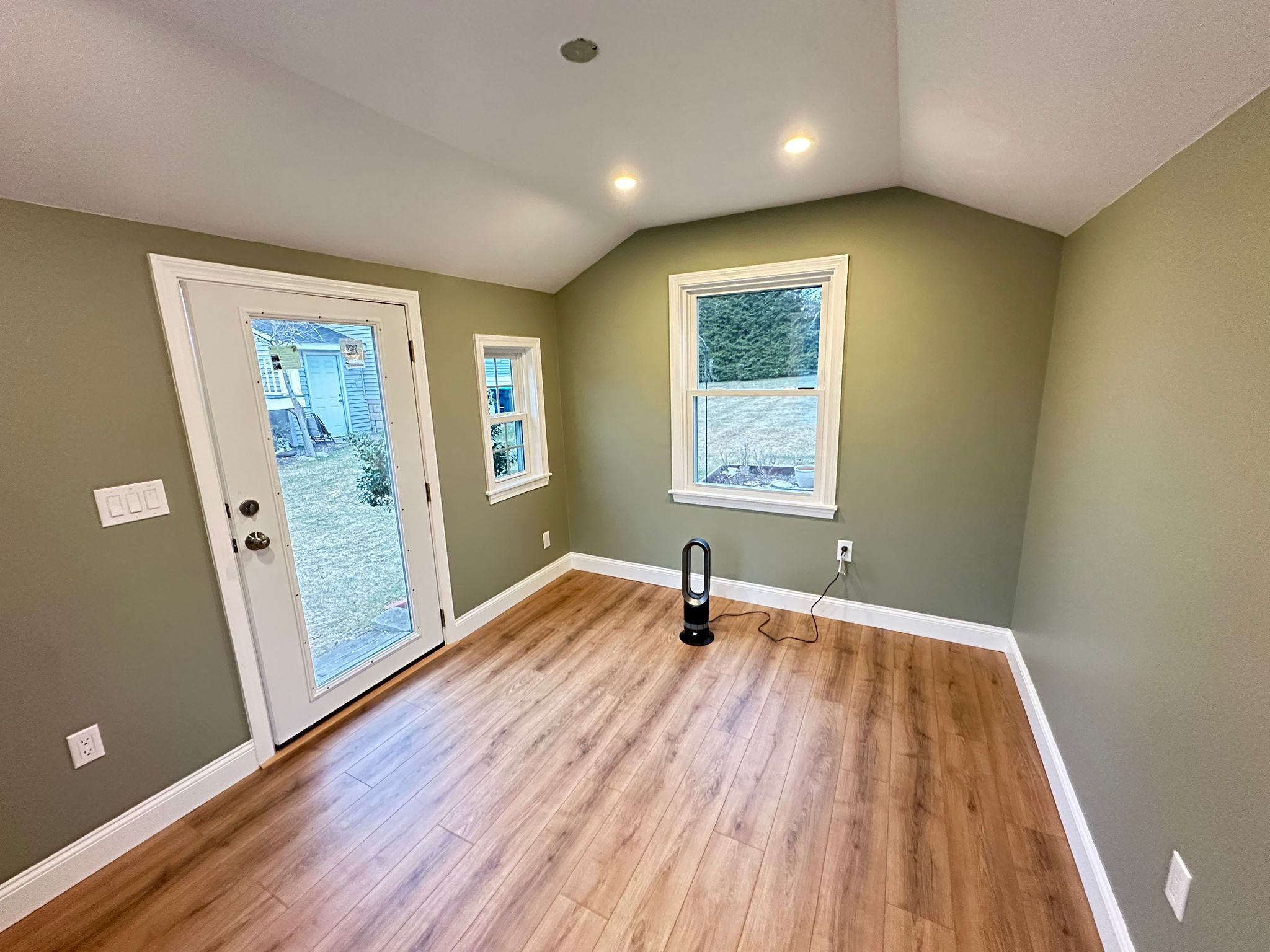Bright bedroom with smooth wall finish